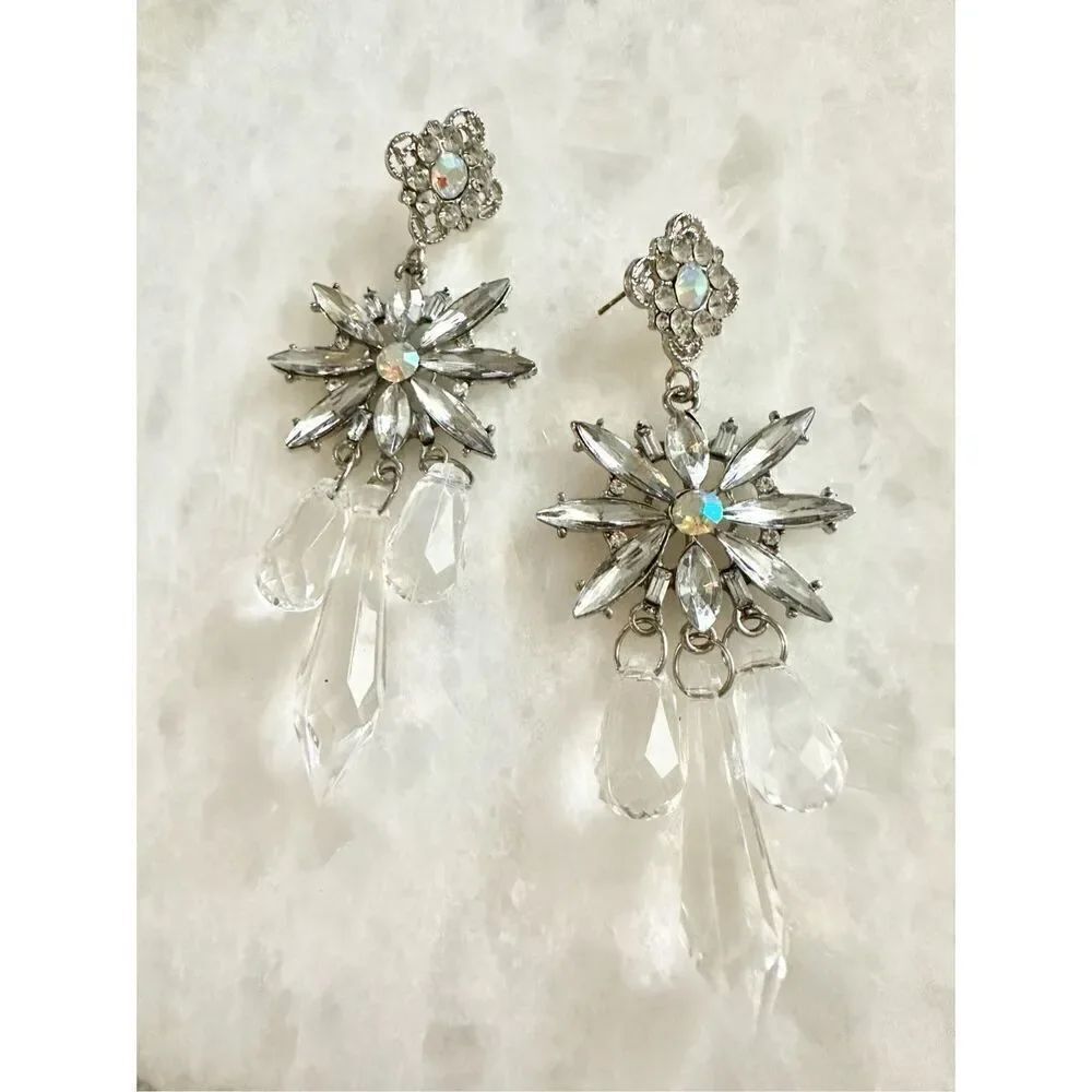 Iridescent snowflake and silver color dangle earrings